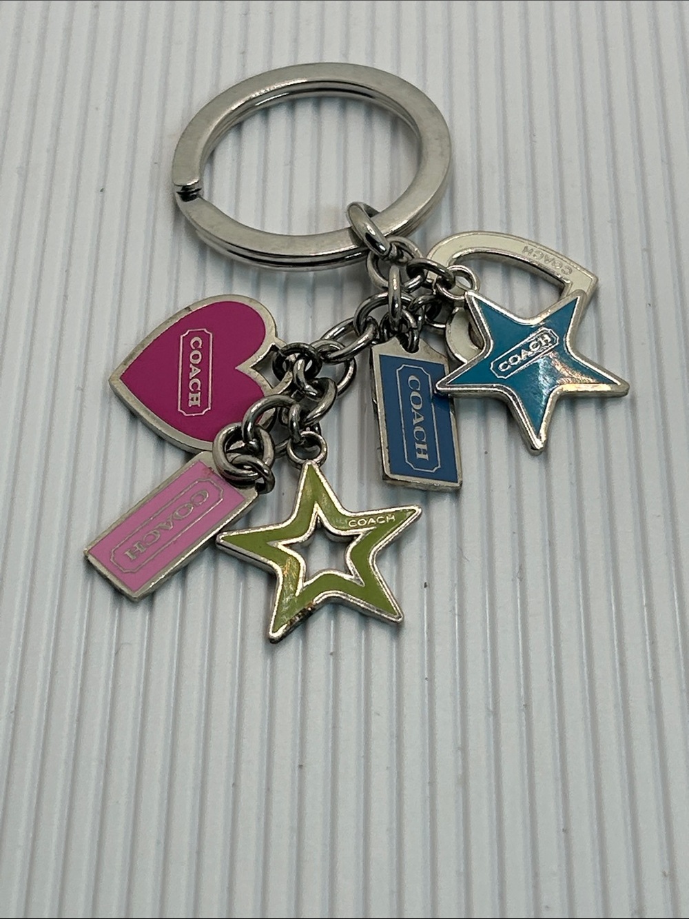 COACH Kids Enamel Charm Keyring in Pink, Blue, Green